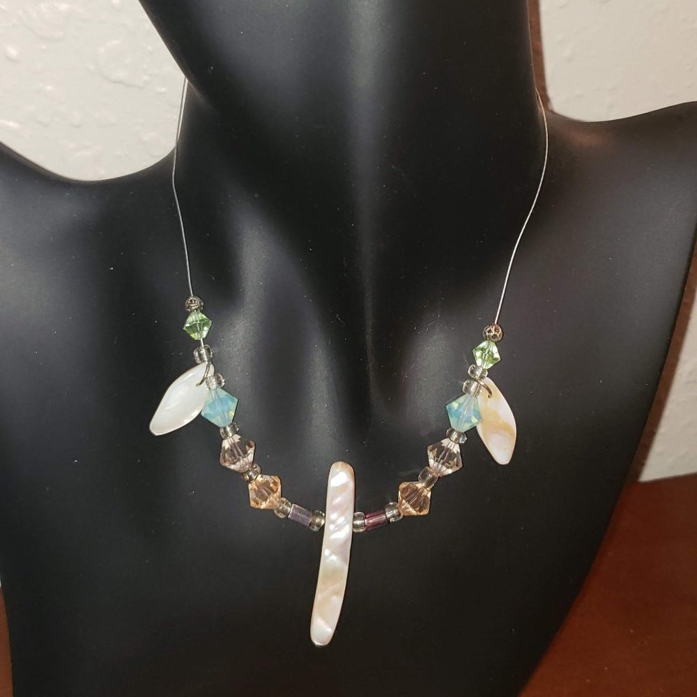 Silver necklace with colorful beads and opals and matching earrings